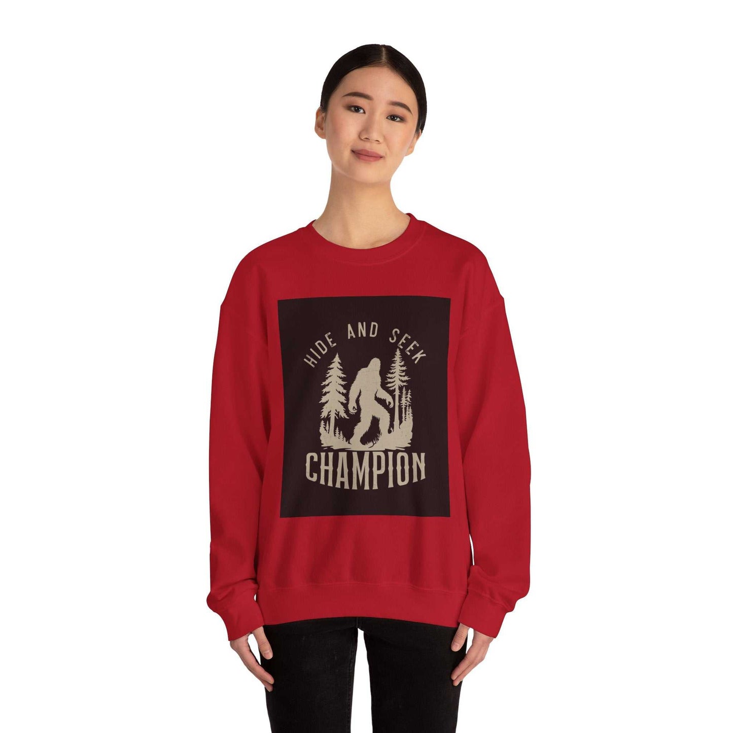 Unisex Heavy Blend™ Crewneck Sweatshirt in red featuring "Hide and Seek Champion" graphic.