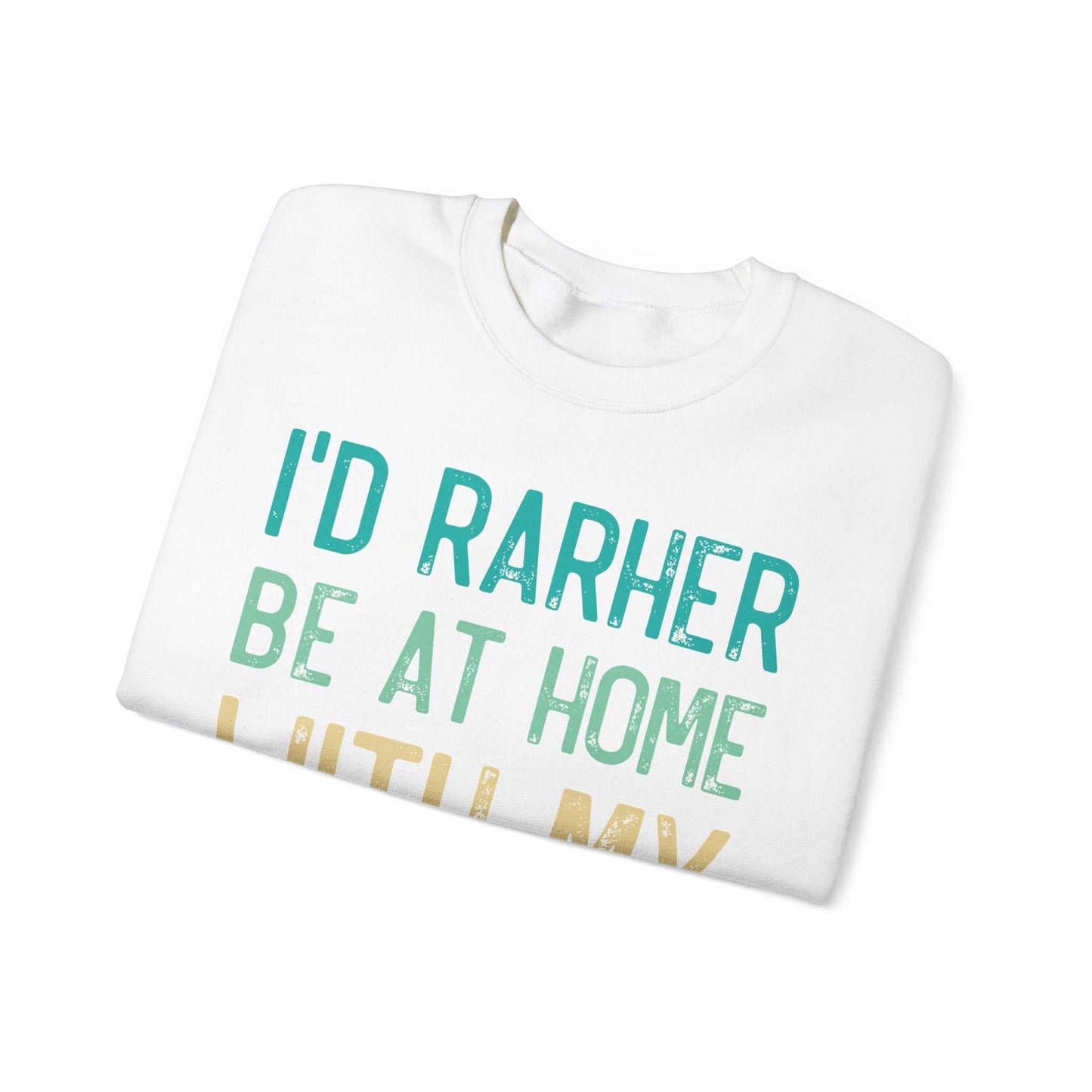 Unisex Heavy Blend™ Crewneck Sweatshirt folded, featuring "I'd Rather Be At Home" graphic design.