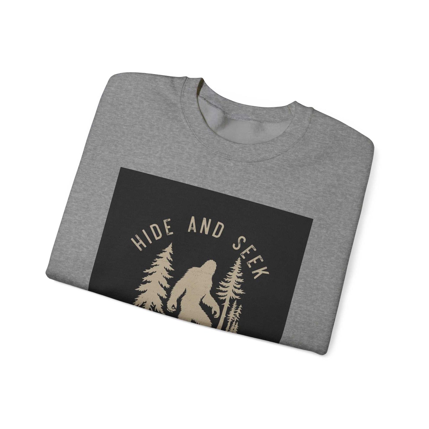 Unisex Heavy Blend™ Crewneck Sweatshirt in gray with "Hide and Seek" design, ribbed knit collar, and durable stitching.