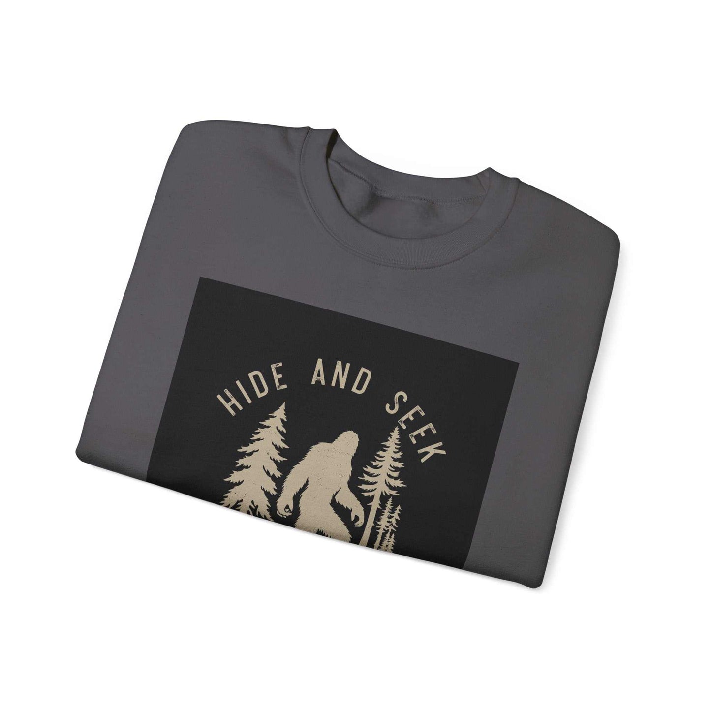 Unisex Heavy Blend™ Crewneck Sweatshirt with "Hide and Seek" graphic design, folded, ideal for comfort and style.