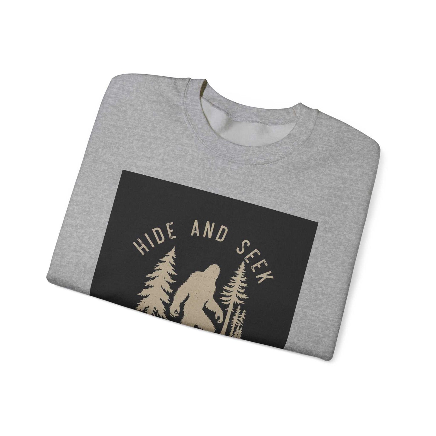 Unisex Heavy Blend™ Crewneck Sweatshirt with "Hide and Seek" design, gray fabric, folded view.