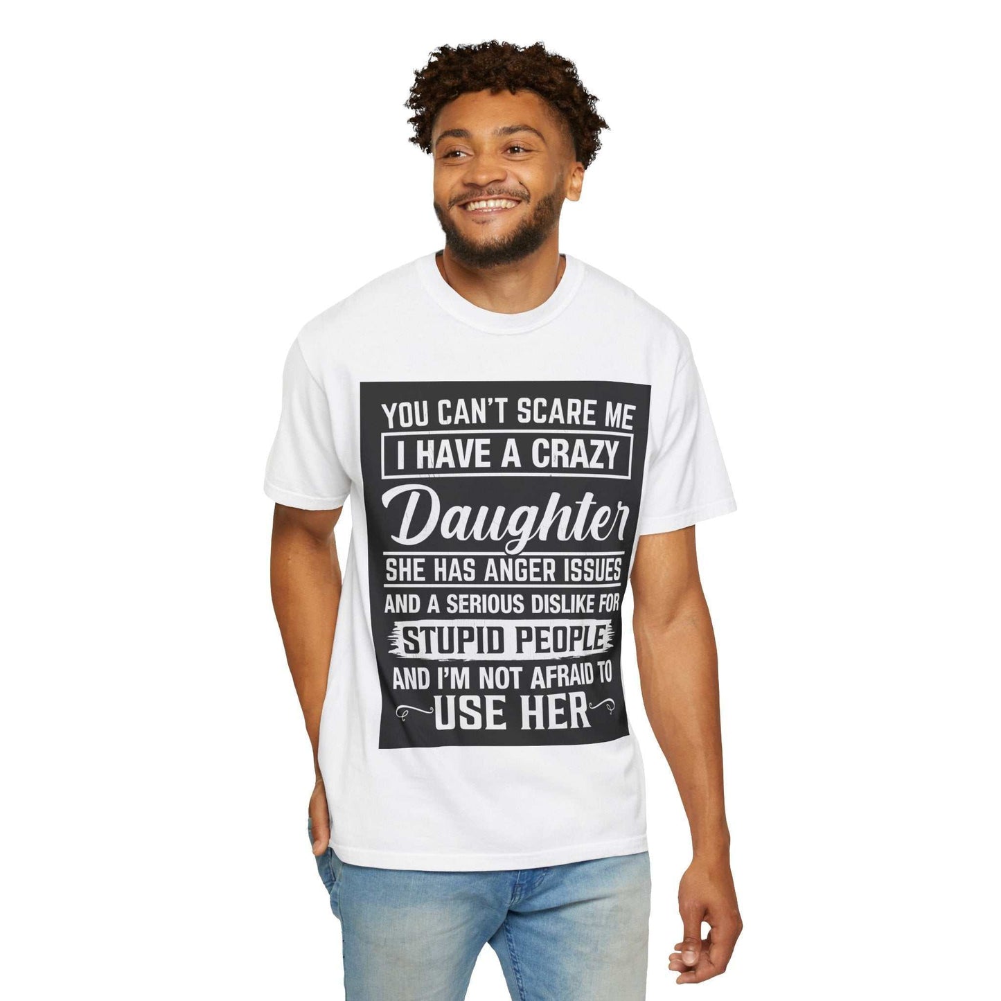 Unisex garment-dyed t-shirt by Comfort Colors 1717, worn by a smiling person, featuring a bold graphic design.