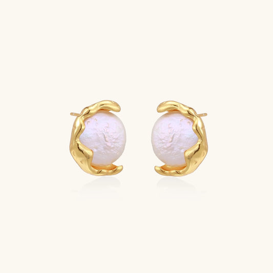 Gold vermeil studs with lustrous pink freshwater pearls in organic crescent settings