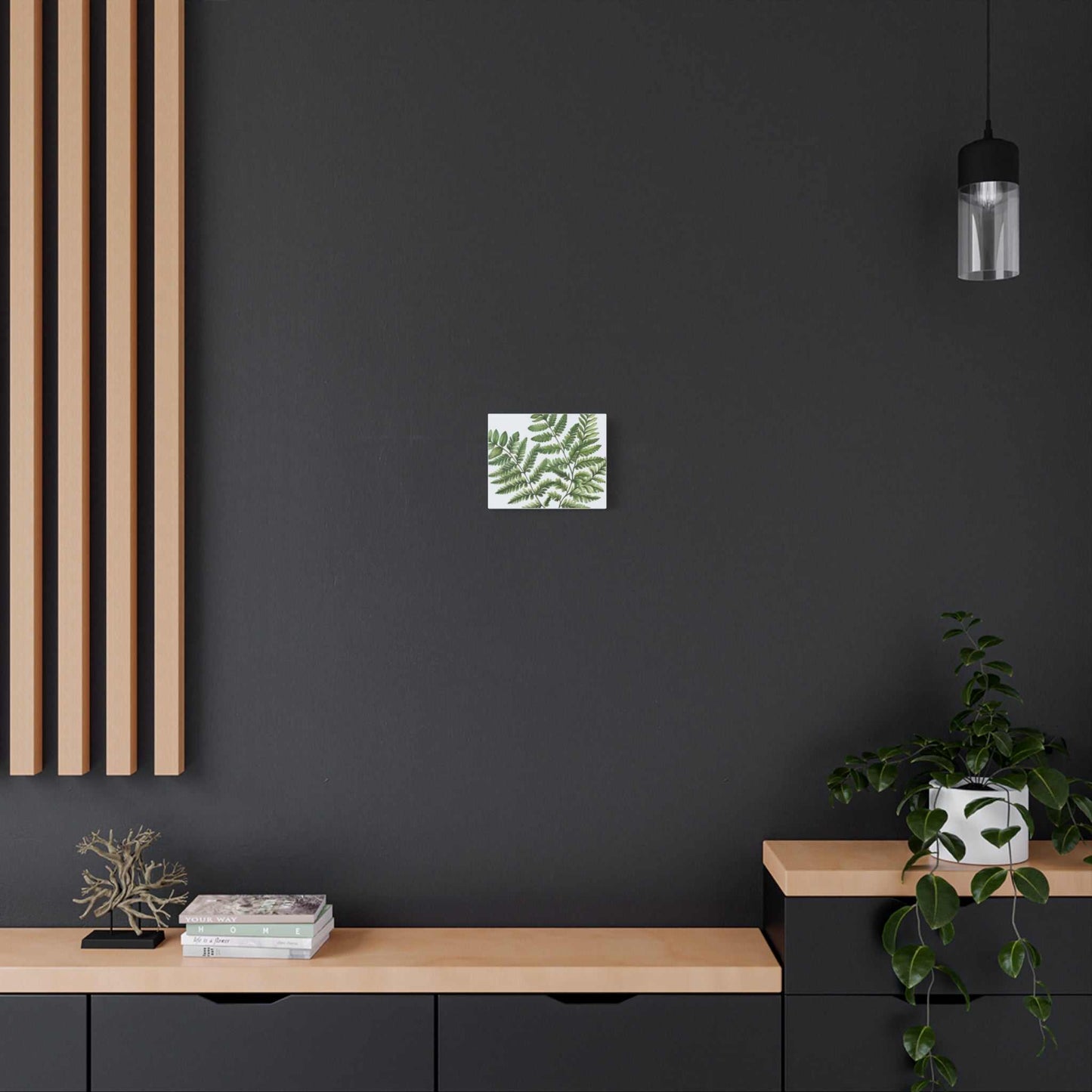 Matte canvas artwork hanging on a dark wall, featuring renewable pine wood frame.