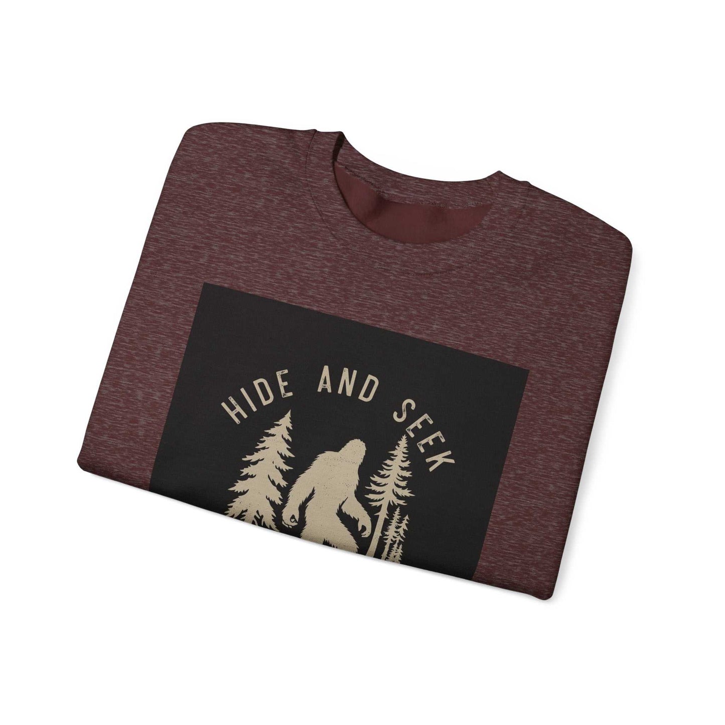 Unisex Heavy Blend™ Crewneck Sweatshirt folded with "Hide and Seek" design, brown.