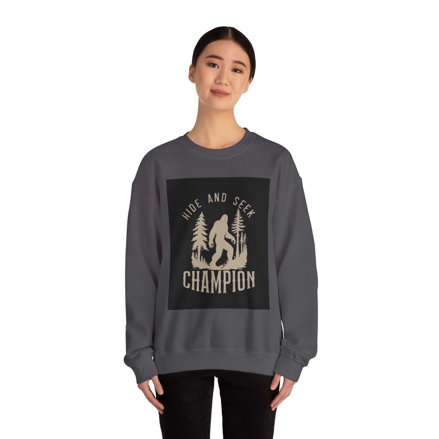 Unisex Heavy Blend™ Crewneck Sweatshirt in dark gray with "Hide and Seek Champion" design, perfect for cold weather comfort.
