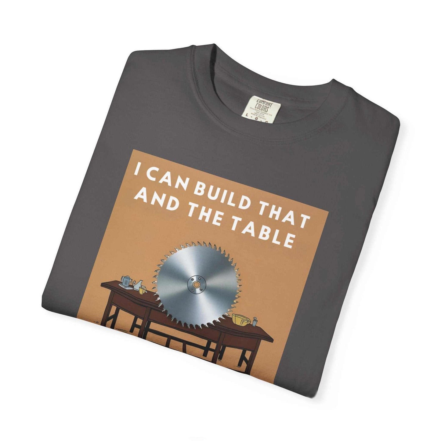 Unisex Garment-Dyed T-shirt with graphic design, folded on table.