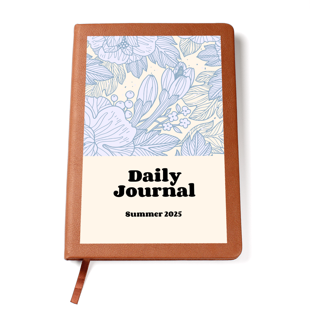 Daily reflections journal with floral design on vegan leather cover.