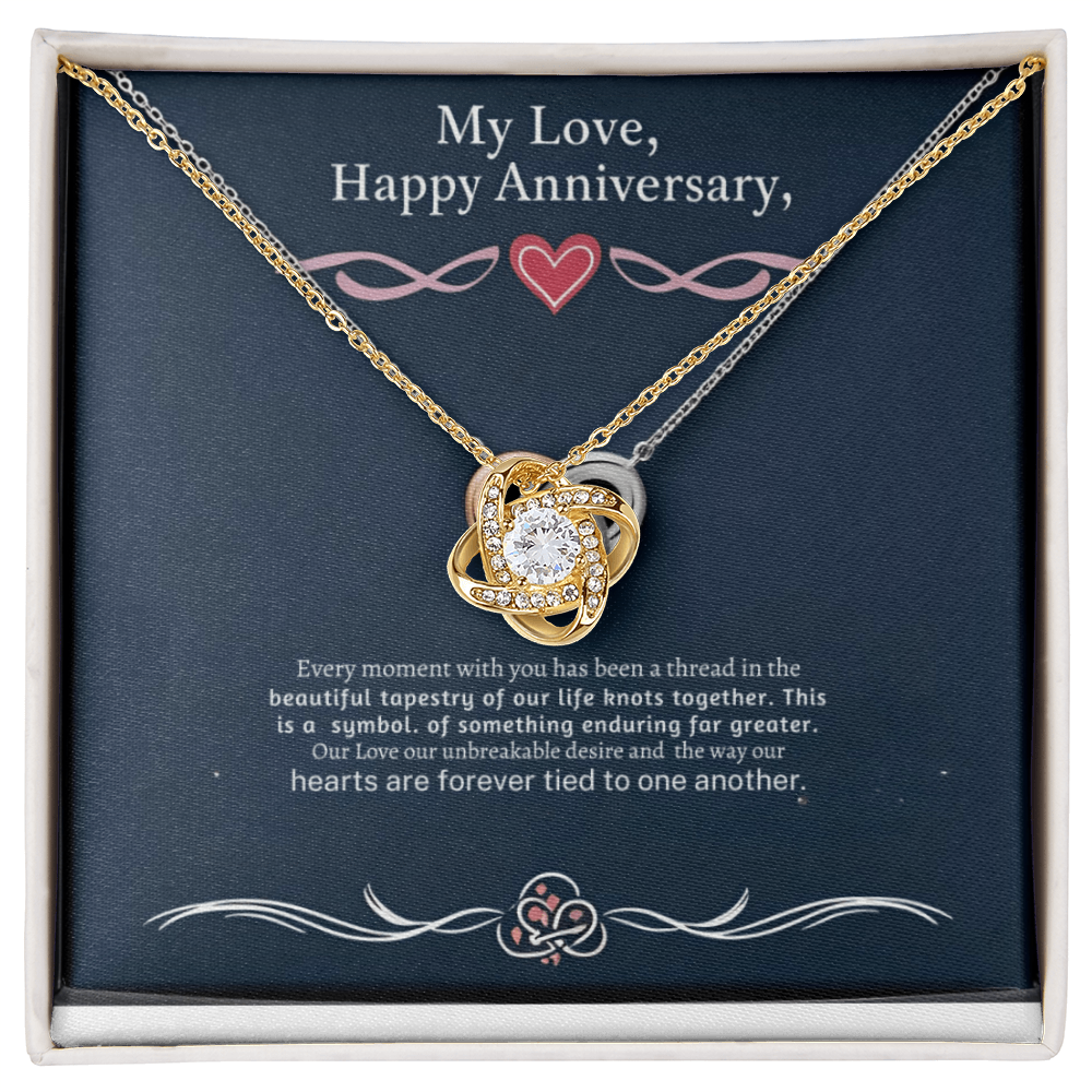 Love Knot Necklace with cubic zirconia, gold finish, in a gift box for anniversaries.