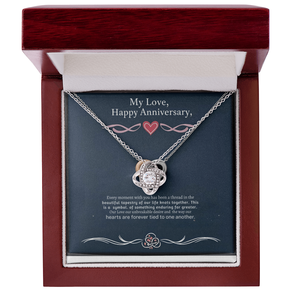 Love Knot Necklace in luxury box with LED spotlight, featuring cubic zirconia pendant, perfect gift for loved ones.