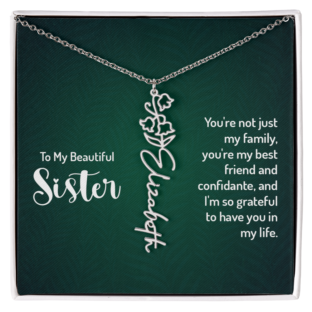 Personalized sister necklace with floral design in gift box, featuring the name "Elizabeth" and a heartfelt message.