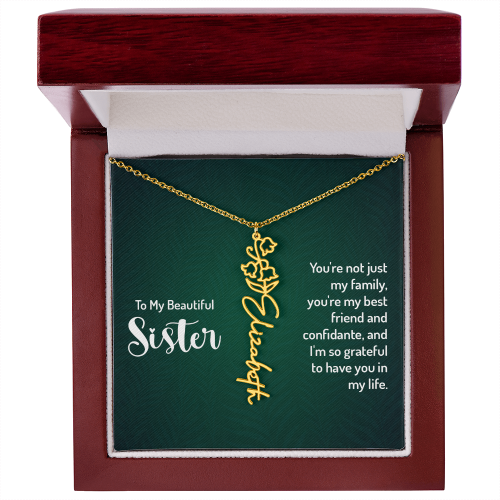 Personalized sister necklace with floral design in a soft touch gift box.