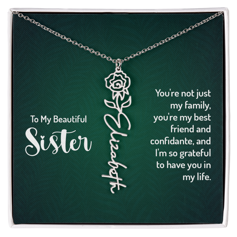 Personalized sister necklace with floral design and custom name engraving.