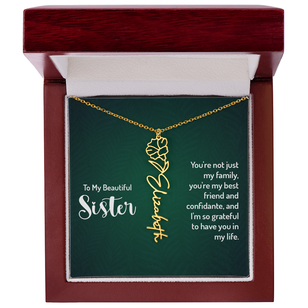 Personalized sister necklace with floral design and custom name in gift box.