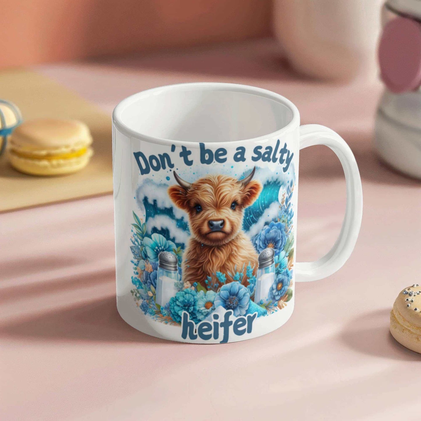 Humorous ceramic coffee mug with "Don't be a salty heifer" design, great gift for coffee lovers.