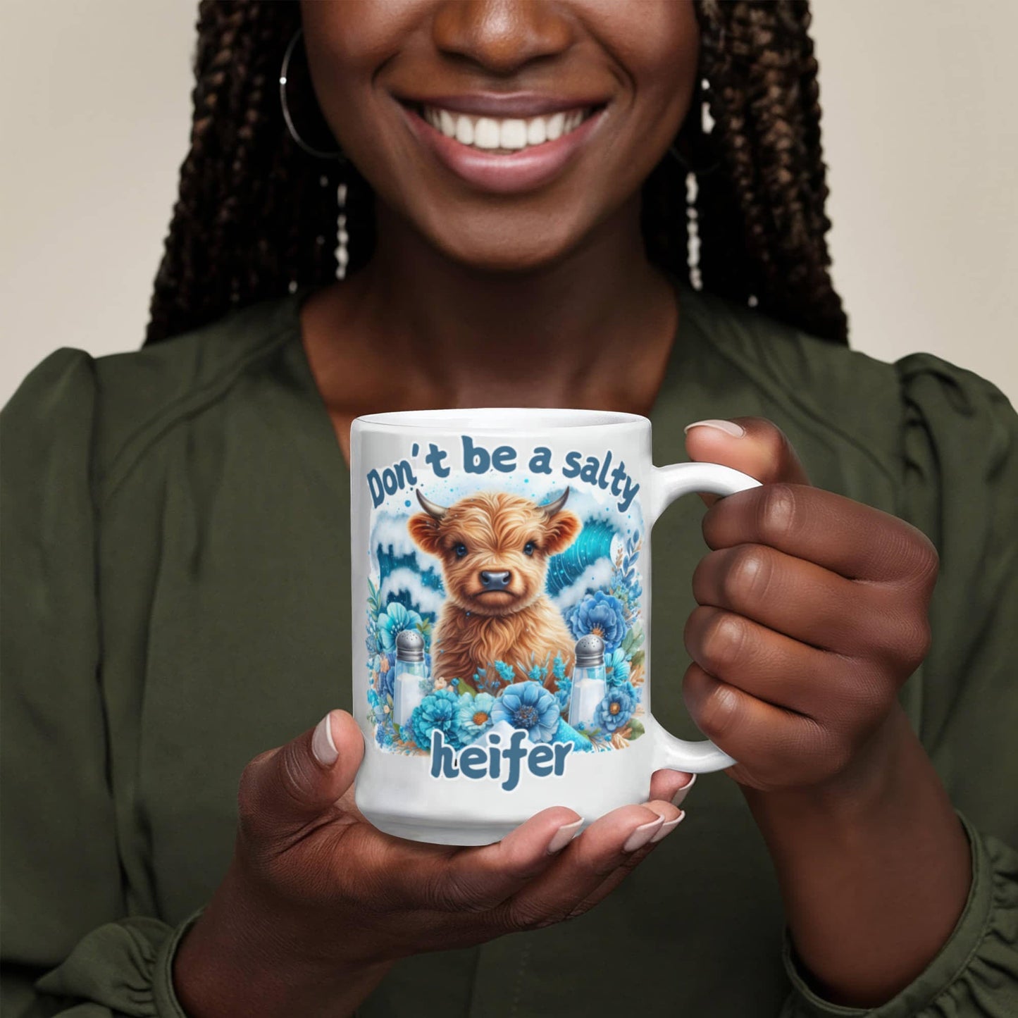 Humorous coffee mug with "Don't be a salty heifer" text, ideal office gift for coffee lovers.