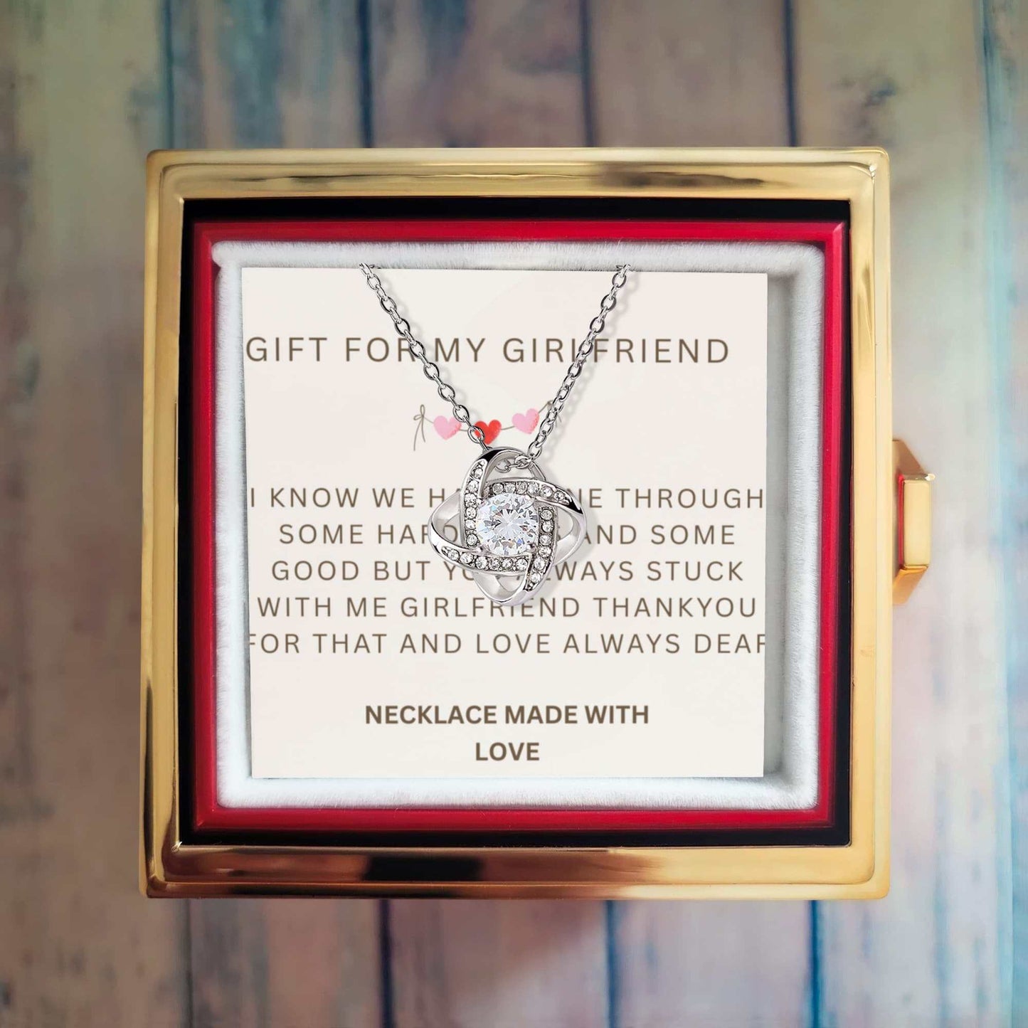 Love Knot Necklace in luxurious gift box with preserved rose, symbolizing eternal love.