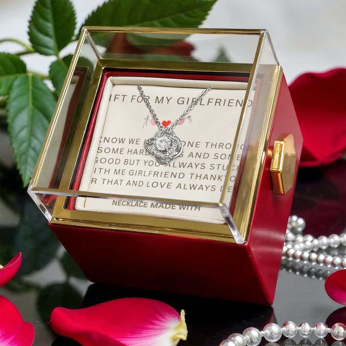 Love Knot Necklace in luxurious box with preserved rose, perfect sentimental gift.