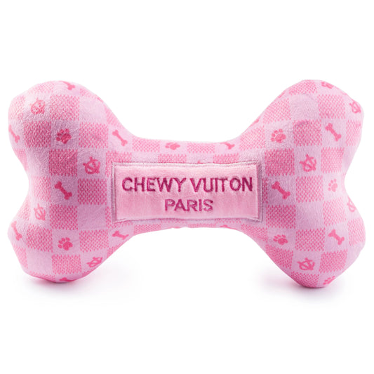 Pink Checker Chewy Vuiton Bone dog toy with plush texture and luxurious design.