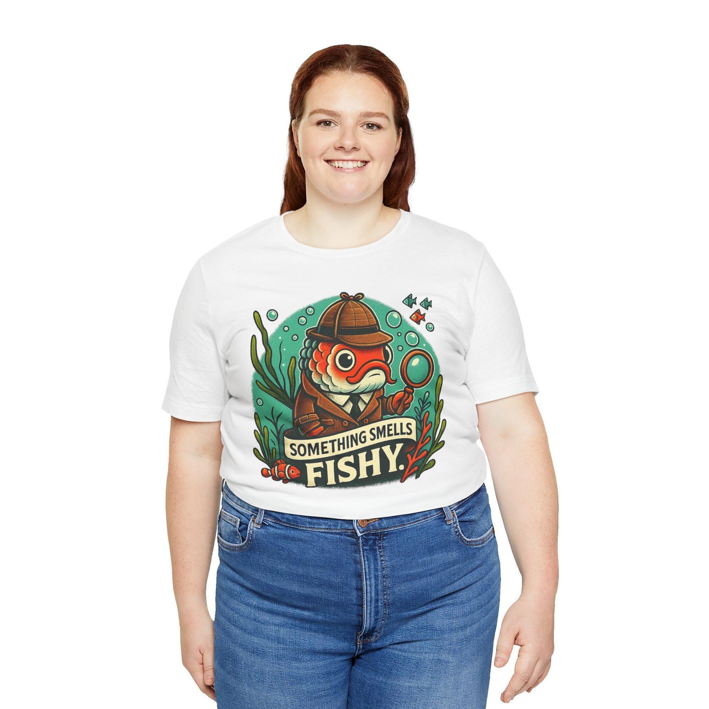 Something smells fishy Unisex Jersey Short Sleeve Tee Fish dressed up as a detective with a magnifying glass underwater fish swimming by. - Toddcraft