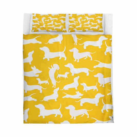 Velveteen plush blanket with dachshund print for dog lovers in vibrant yellow and white design.