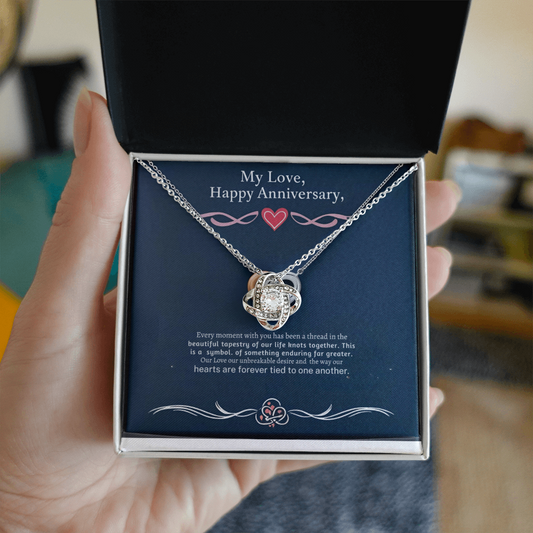 Love Knot Necklace with cubic zirconia in a gift box, symbolizing unbreakable bonds.