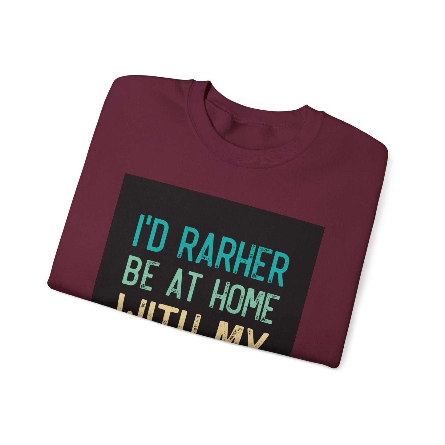 Unisex Heavy Blend™ Crewneck Sweatshirt in burgundy, featuring phrase "I'd Rather Be at Home."