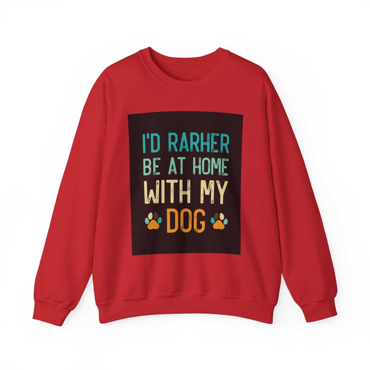 Red unisex heavy blend crewneck sweatshirt with "I'd rather be at home with my dog" slogan, showcasing paw prints.
