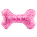 Pink Checker Chewy Vuiton Bone toy for dogs with plush texture.