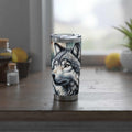 Vagabond Wolf 20oz Tumbler featuring a wolf design, ideal for adventurers; vibrant insulated travel mug.
