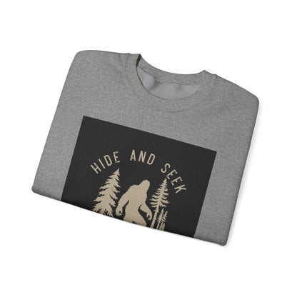 Unisex Heavy Blend™ Crewneck Sweatshirt in gray with "Hide and Seek" design, ribbed knit collar, and durable stitching.