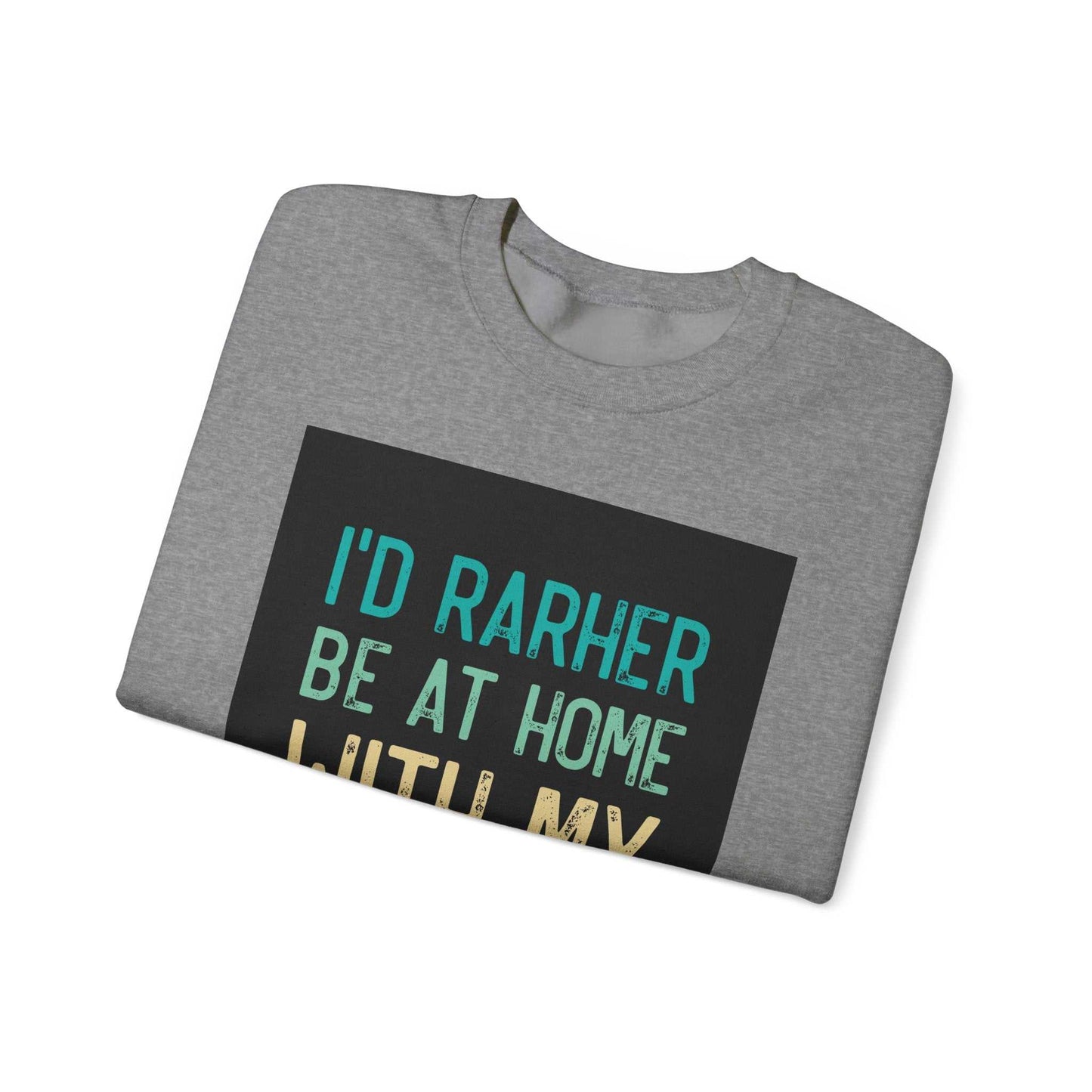 Unisex Heavy Blend™ Crewneck Sweatshirt in gray with the text "I'd rather be at home" on the front, highlighting a comfortable and classic design.