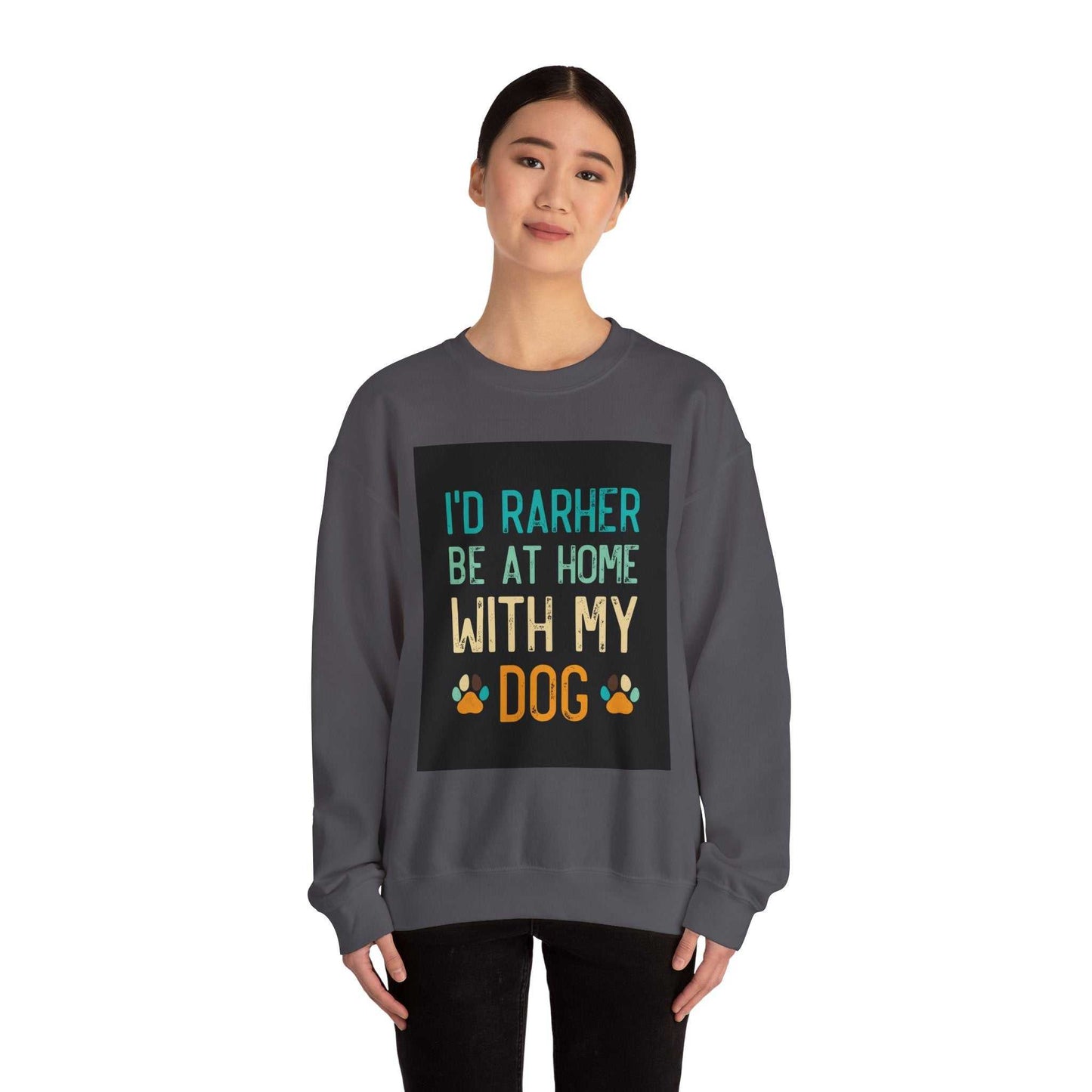 Unisex Heavy Blend™ Crewneck Sweatshirt with "I'd Rather Be Home With My Dog" graphic, worn by a person, showcasing comfort and style.