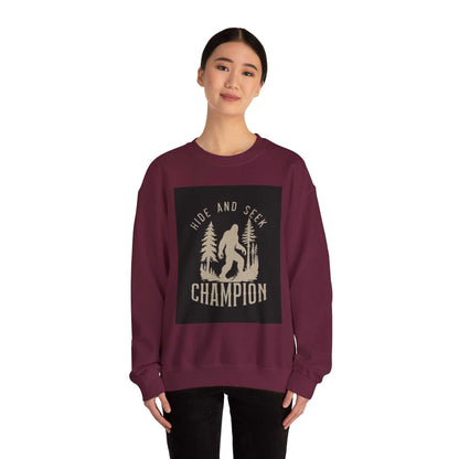 Unisex Heavy Blend™ Crewneck Sweatshirt in maroon with hide and seek champion graphic, ribbed collar, double-needle stitching for durability.