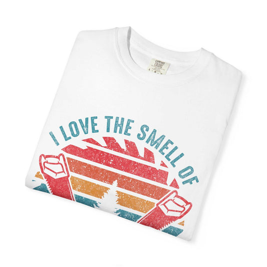 Unisex garment-dyed T-shirt with colorful print design, showcasing "I Love The Smell Of" text, made from 100% ring-spun cotton for comfort and durability.