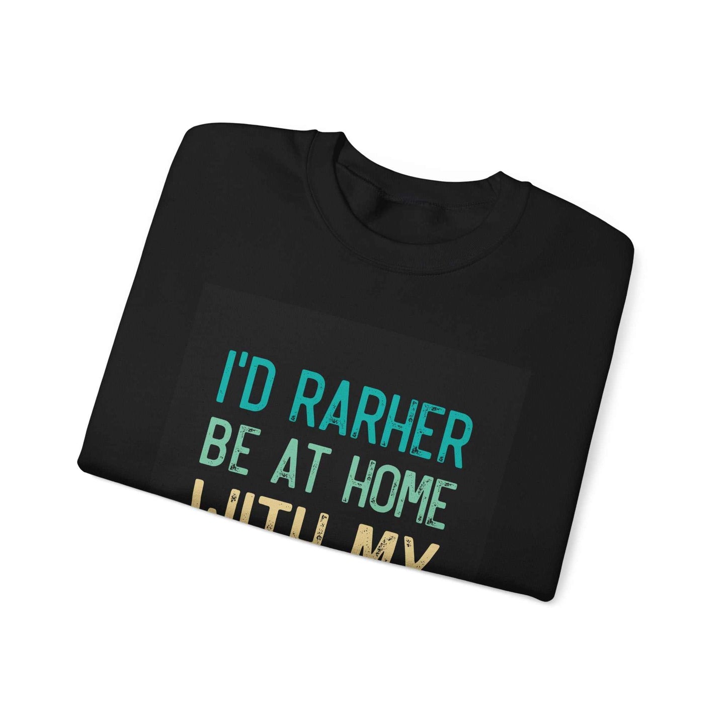 Unisex Heavy Blend™ Crewneck Sweatshirt with "I'd rather be at home" graphic, folded.
