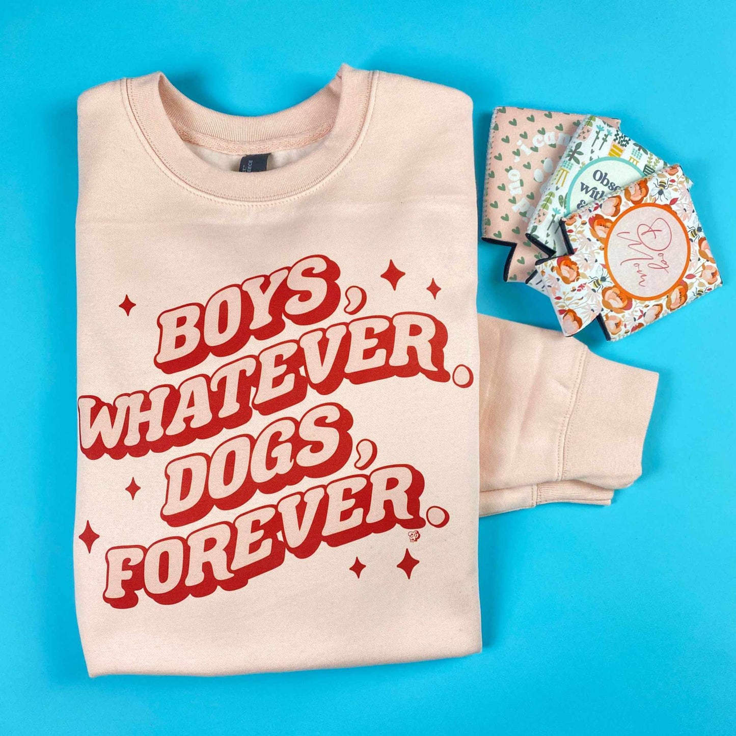 Retro Wave Dogs Forever sweatshirt in rose pink with multicolored print, supporting local shelters.