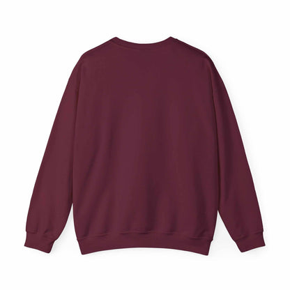 Unisex Heavy Blend™ Crewneck Sweatshirt in maroon, featuring medium-heavy fabric for comfort and durability, perfect for colder months.