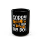 Black mug with playful "Plans With My Dog" message for dog lovers.