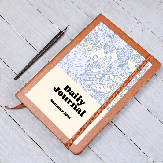 Vegan leather daily journal with floral design, elastic closure, and ribbon bookmark.