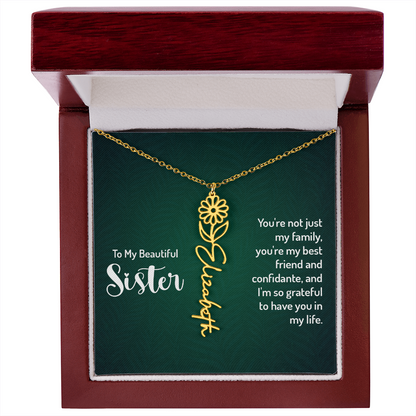 Personlized sister necklace with floral design in gift box.