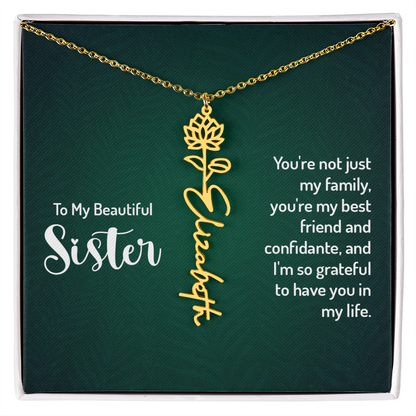 Floral design personalized sister necklace with cursive name and birth flower.