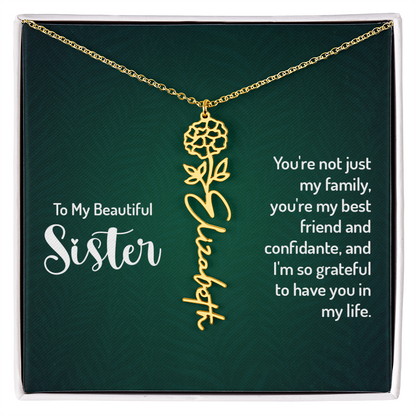 Personalized sister necklace with floral design in gold finish, featured in a gift box with a heartfelt message.