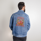 Men's DTG Denim Jacket with custom back print design, worn by a person, showcasing retirement riding theme.