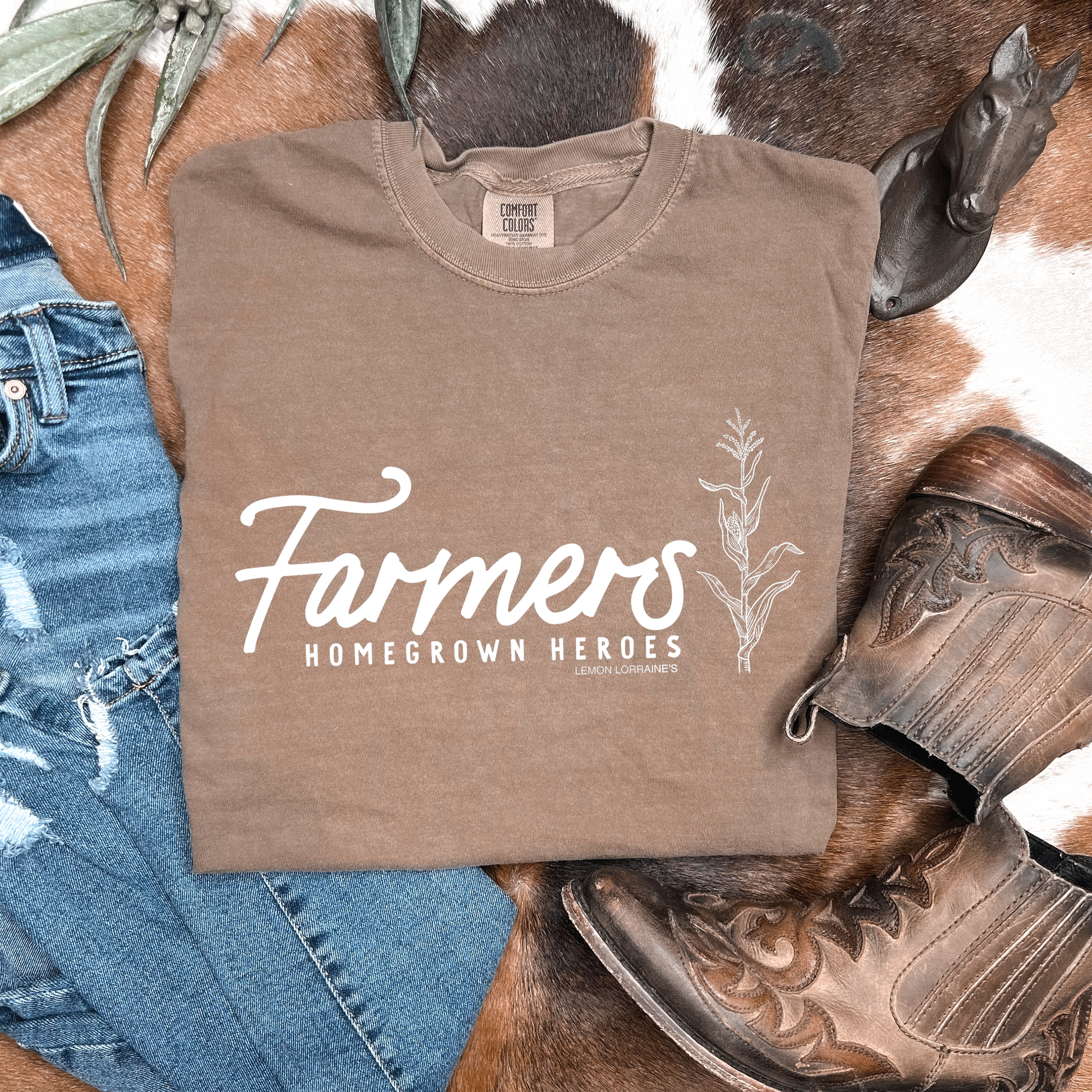 Espresso graphic tee with "Farmers: Homegrown Heroes" text, screen printed in white ink, made of 100% ring spun cotton.