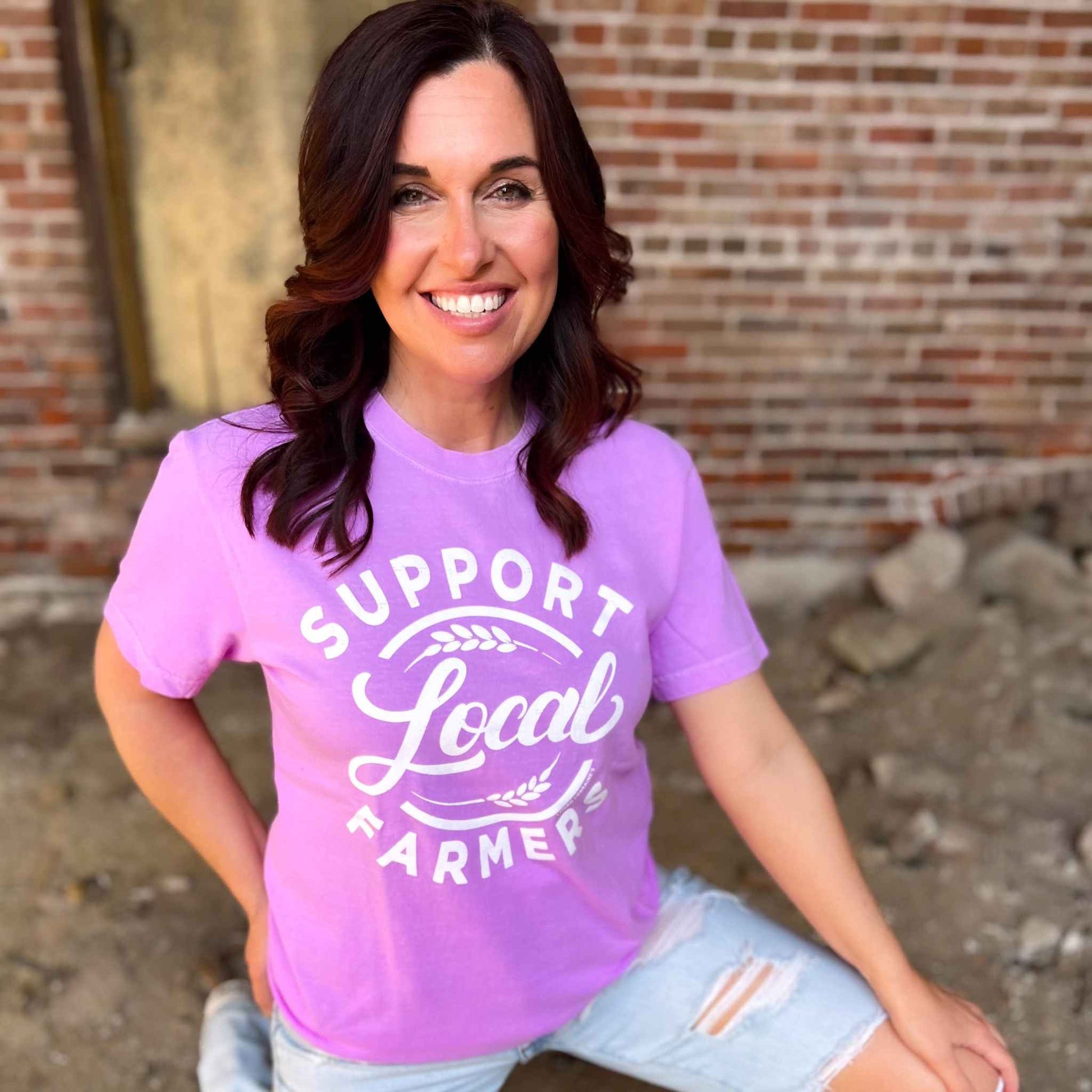 Neon violet "SUPPORT LOCAL FARMERS" graphic tee, unisex fit, 100% cotton.