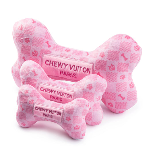 Pink Checker Chewy Vuiton Bone dog toy in three sizes, plush and squeaky.