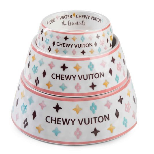 White Chewy Vuiton dog bowls in three sizes with colorful pattern and non-skid bottom.