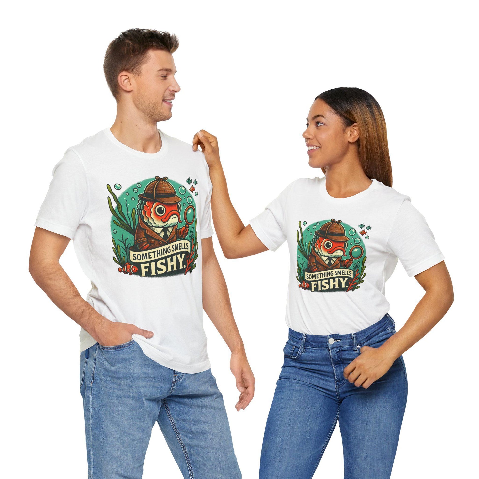 Something smells fishy Unisex Jersey Short Sleeve Tee Fish dressed up as a detective with a magnifying glass underwater fish swimming by. - Toddcraft