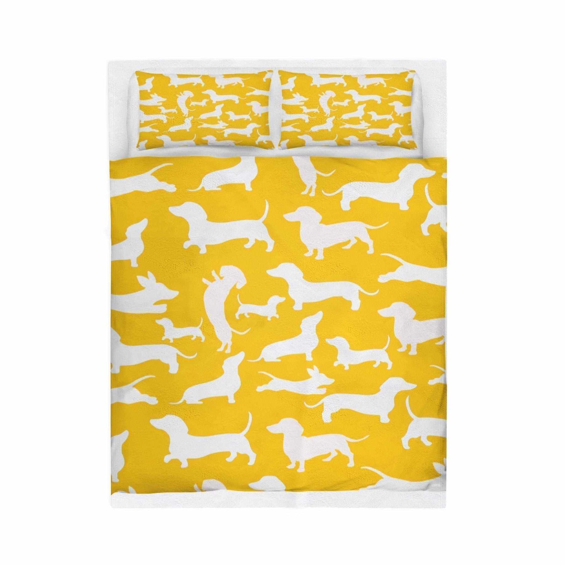 Yellow velveteen plush blanket with white dog silhouettes, cozy and soft for dog lovers.